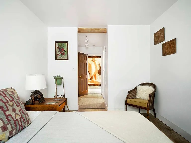 master bedroom looking into walk through closet and ensuite bathroom