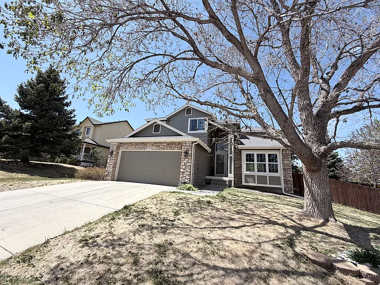 5381 S Dunkirk Way — Photo 1