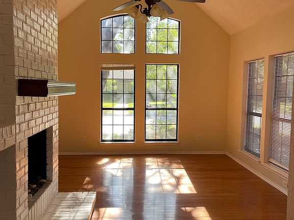 Vaulted ceiling living room with fireplace
