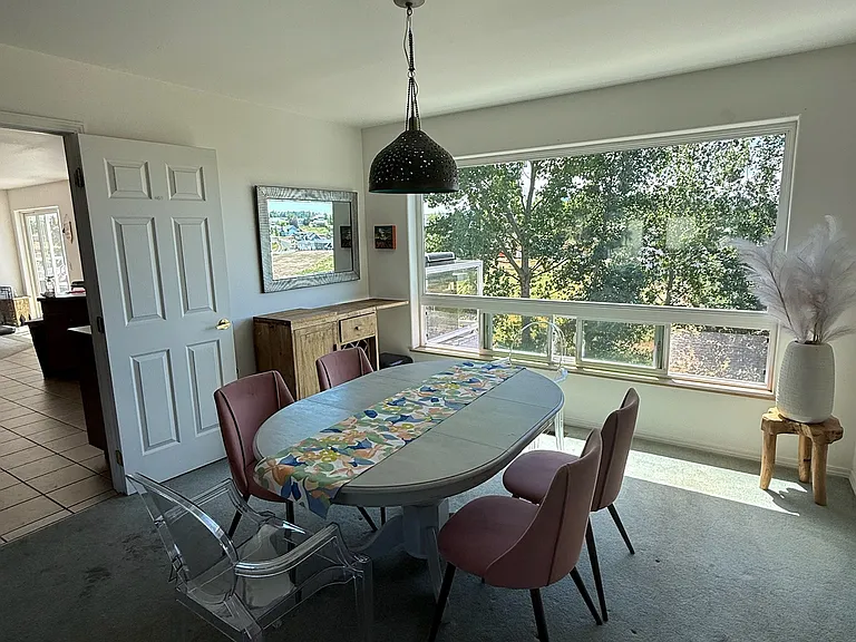 Dining room off (connected to kitchen through door)