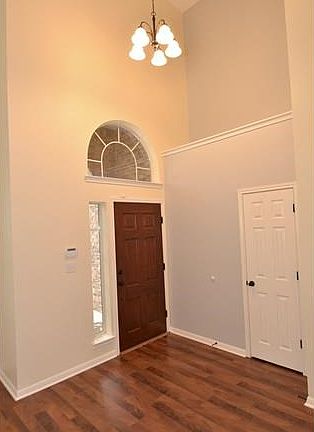 As you enter, you will find a two-story foyer with art ledge and convenient coat closet.
