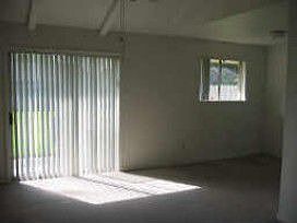 Family room with sliding door to back yard