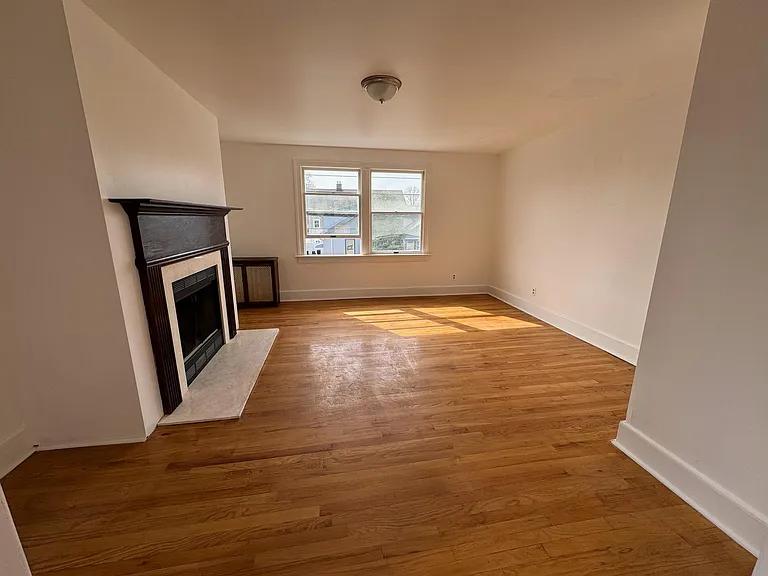 Large living room featuring a fireplace.