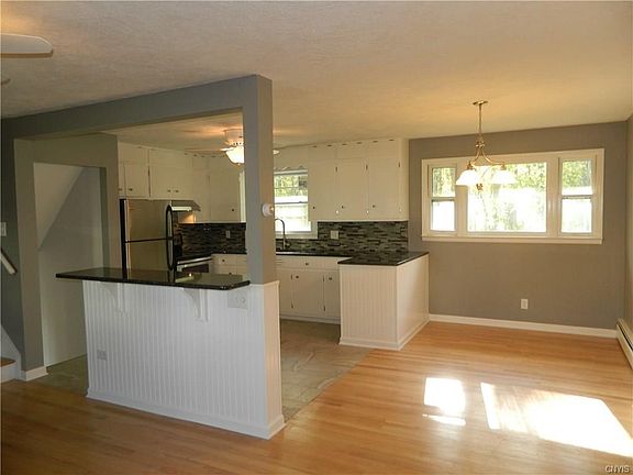 kitchen breakfast bar and formal dining room.
