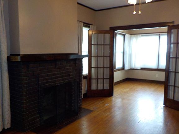 Living Room, Fireplace. French Doors to Sun Room or 3rd Bedroom