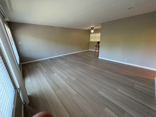 Living Room / Dining Room: New Oak Laminate Flooring, all new baseboards