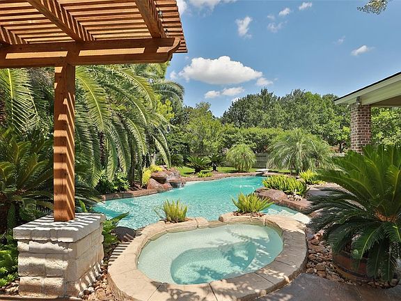 The property is just under 1/2 acre of lush landscaping, recently re-plastered pool and spa, outdoor kitchen, firepit and ample covered patio space. Unlike some subdivision properties this home has a lot of extra green space perfect for play sets, pu