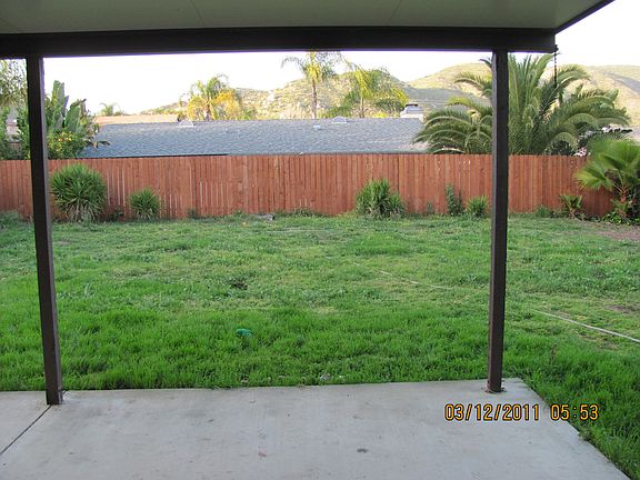 Large backyard with secure fence for pets.