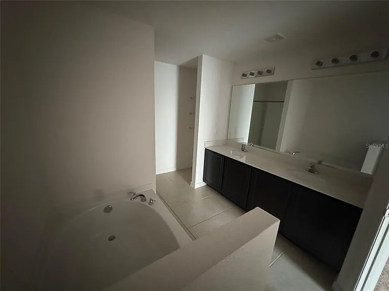 6909 Crested Orchid Dr — Photo 12