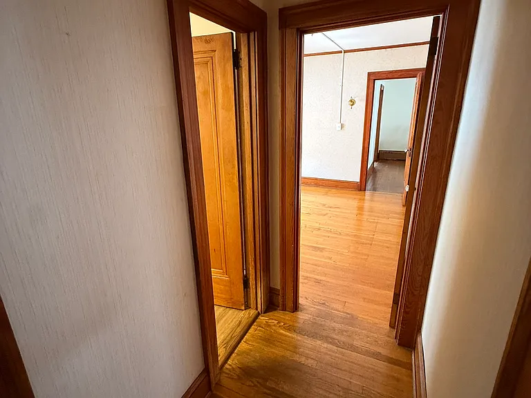 Hallway to bathroom and front room