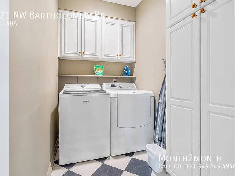 9021 NW Bartholomew Dr — Photo 34