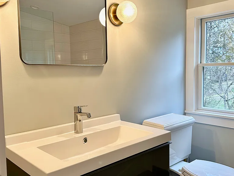 Second floor, full bathroom with tub. (Another view of the Interior of the room)