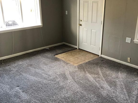 One of three bedrooms