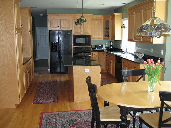 Spacious kitchen featuring granite countertops