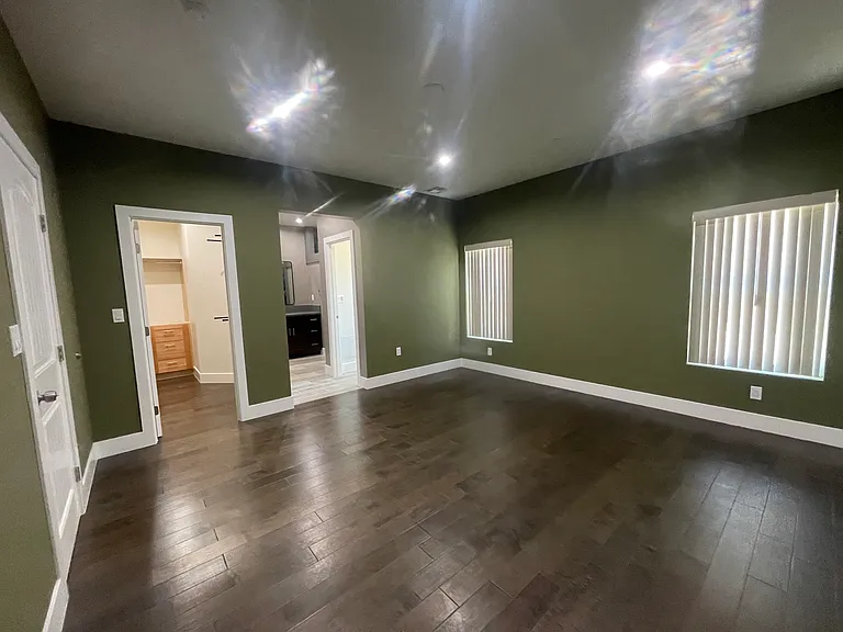 Master Bedroom (partial view of walk in closet & entrance to Master Bath