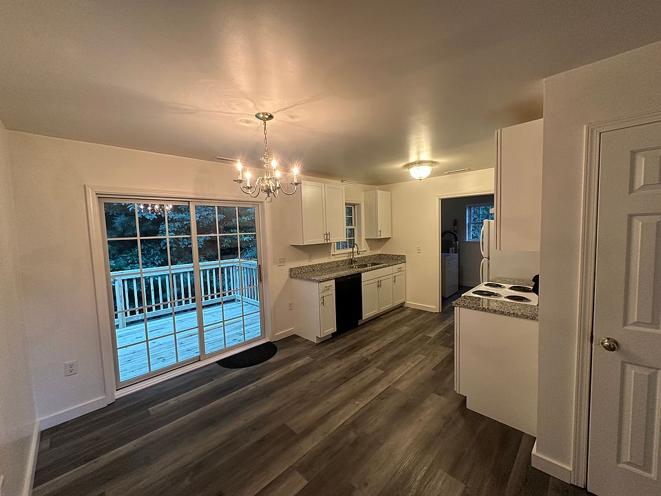 Eat In Kitchen with Sliding Glass Doors onto a large brand new private deck.