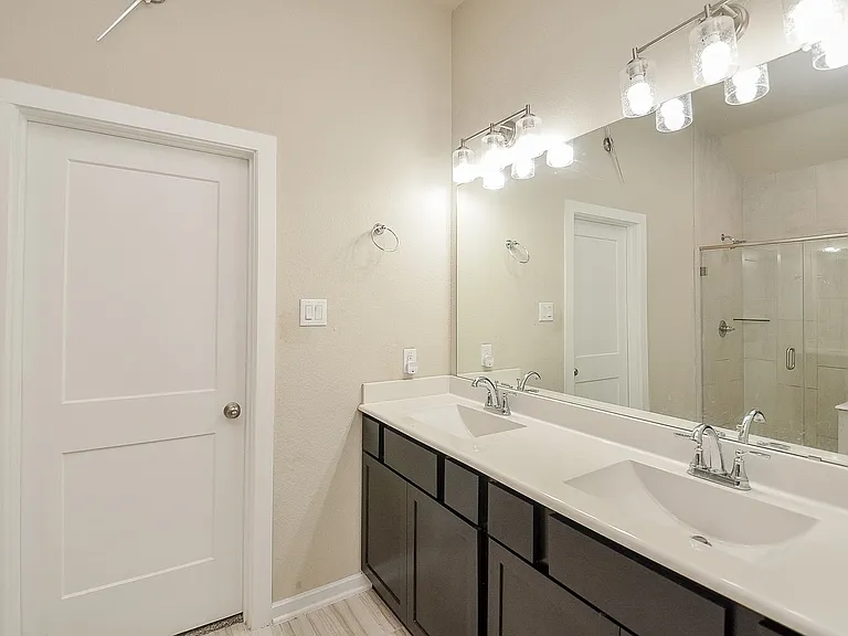 Primary/Master bath. Dual sinks, huge mirror.