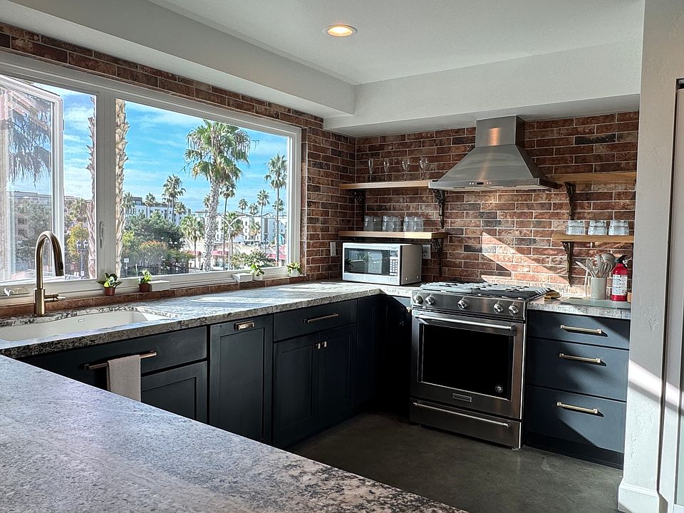 Open Layout with View
Laundry in Kitchen
