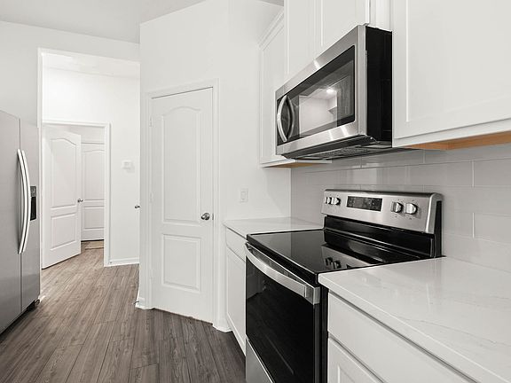 The heart of the home features all new Whirlpool R appliances