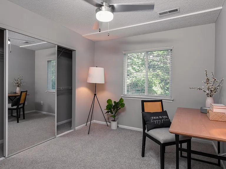 Experience comfort and style in this bright and cozy bedroom complete with ample closet space and modern decor.