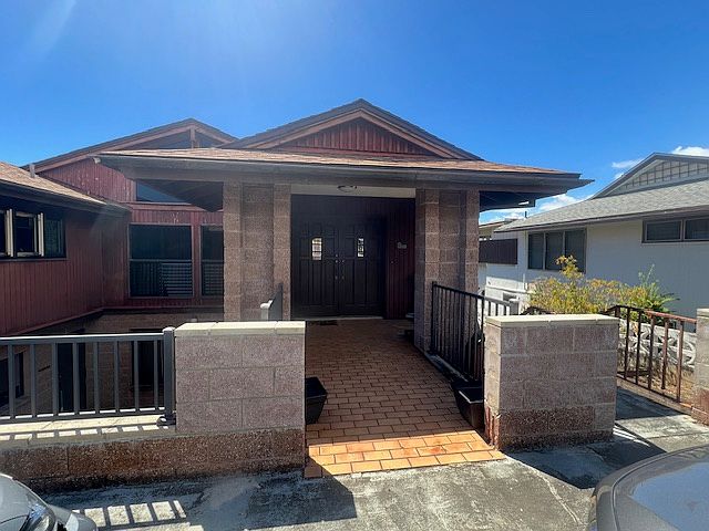 Front of House. Unit is on lower level with private entrance.