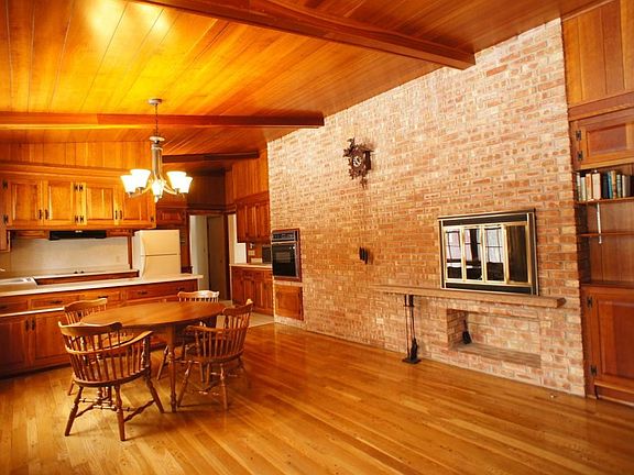 Dinette With Fireplace and Builtins