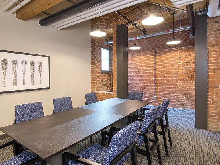 Conference Room With 8 Chair And Large Espresso Table.