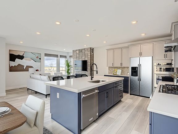 Carly Plan Kitchen Great Room - Virtually Staged