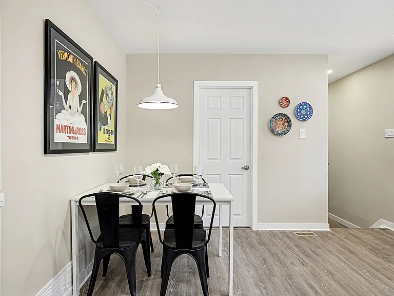 Open dining space perfect for everyday family meals in our fully furnished Ottawa property.
