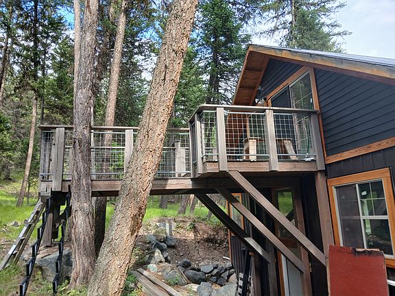 Raised rear deck. This faces the forest. Very private.