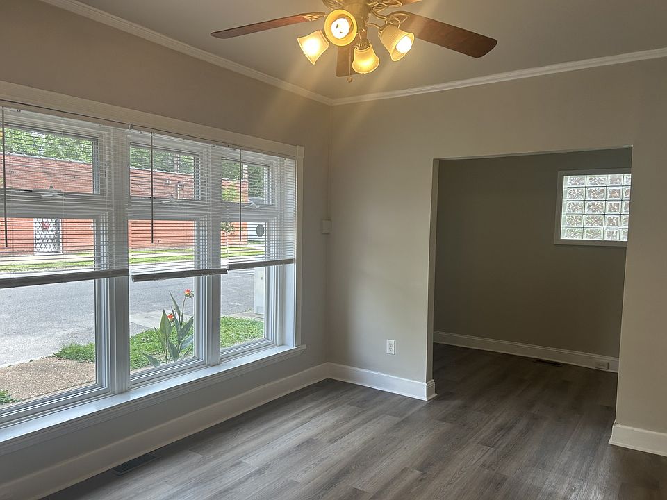 Living room and large window bringing in plenty of light