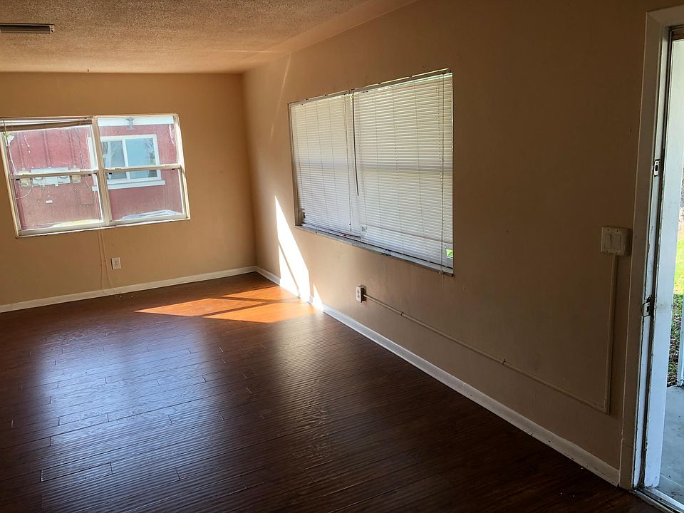 Living room - front door open on right side of picture.