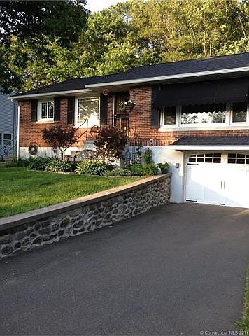 Front of Home/Stone Wall/Dr...