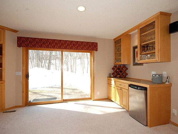 Bar area in family room w/sliding doors to patio