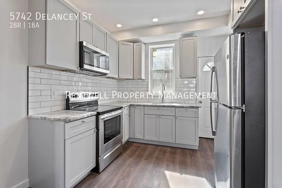 Renovated 2-Bedroom Townhome with Central Air — Photo 1