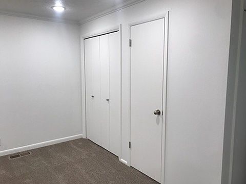 Left side closet is a nice sized kitchen pantry and right side is a cleaning supply closet.