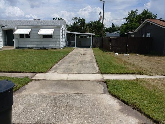 Long driveway and carport