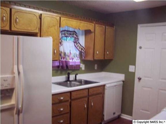 dishwasher and fridge included