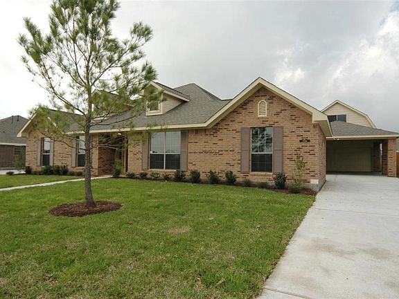 This home move-in ready and the front has been landscaped with beautiful trees and front flowerbeds.