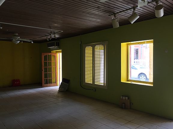 2 doors and 2 windows to street