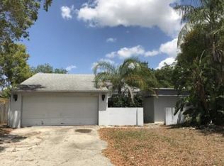 5913 Riddle Rd, Holiday, FL 34690