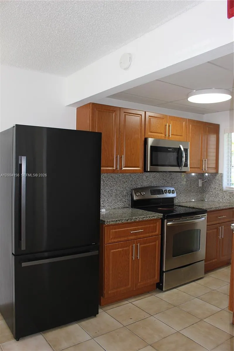 Building Photo - 4050 NW 135th St #5-10