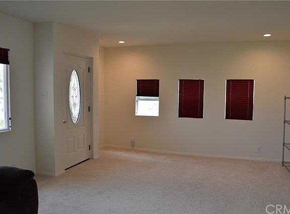 Living Room with new windows and shades