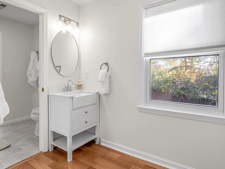 Private vanity area of upstairs queen bedroom