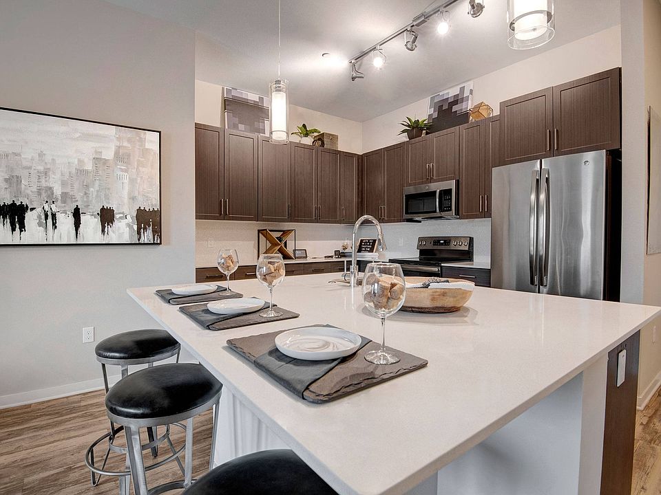 Park on Central Kitchen with hardwood floors, kitchen table and stainless steel appliances