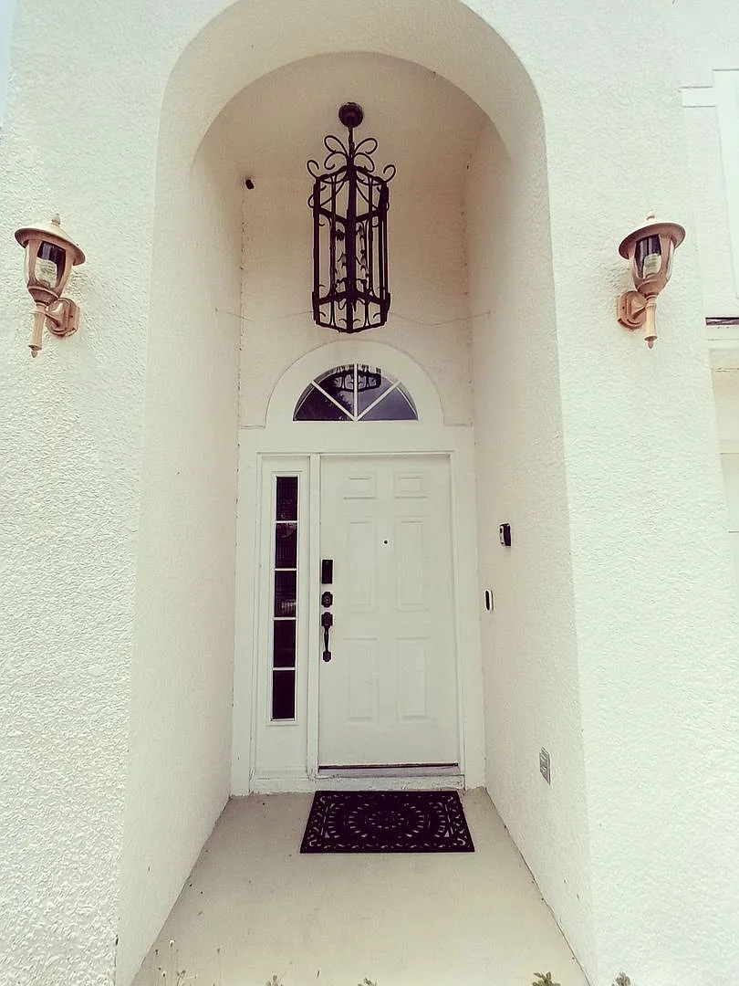 Spacious 4BR/4BA Home with Pool & Serene Water Views — Photo 2