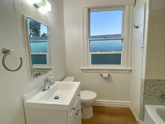 Bathroom w/ new vanity and new medicine cabinet