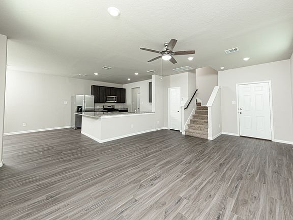 Family Room to Kitchen and Dining Area
