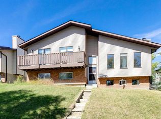 1230 SW Berkley Dr NW, Calgary, AB T3K 1S9