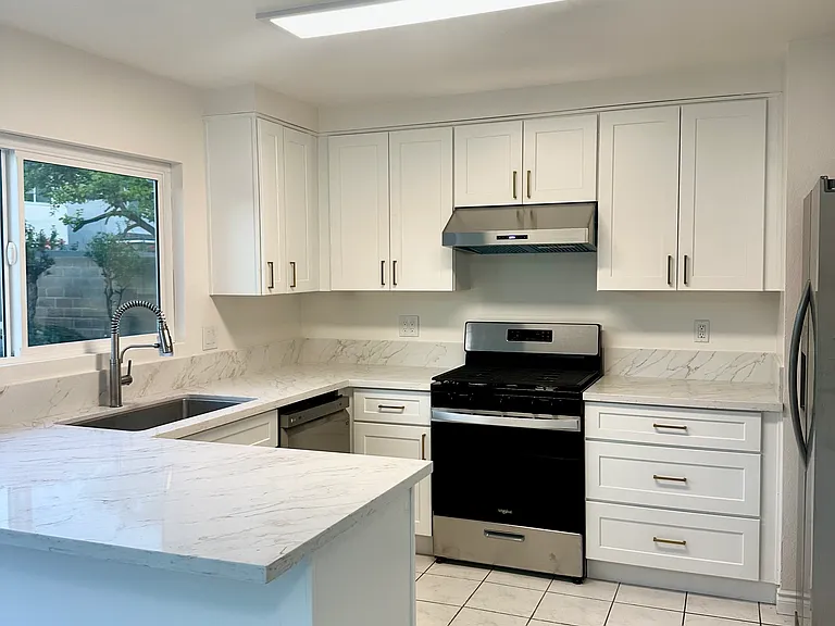 Fully renovated Kitchen with stainless steel appliances